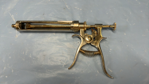 Older Pistol Style Livestock Syringe