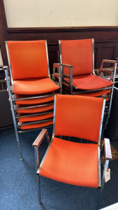 11 Orange Stacking Arm Chairs