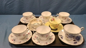 8 Tea Cups and Saucers