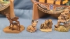 11 Tea Figurines on 3 Collector Style Plates - 4